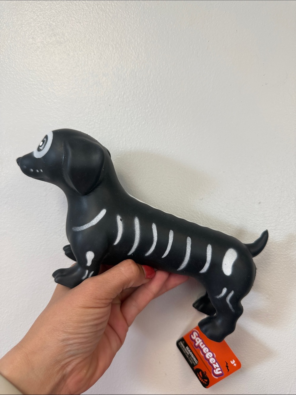 Black Dachshund Squeezable Toy with White Skeleton Detail